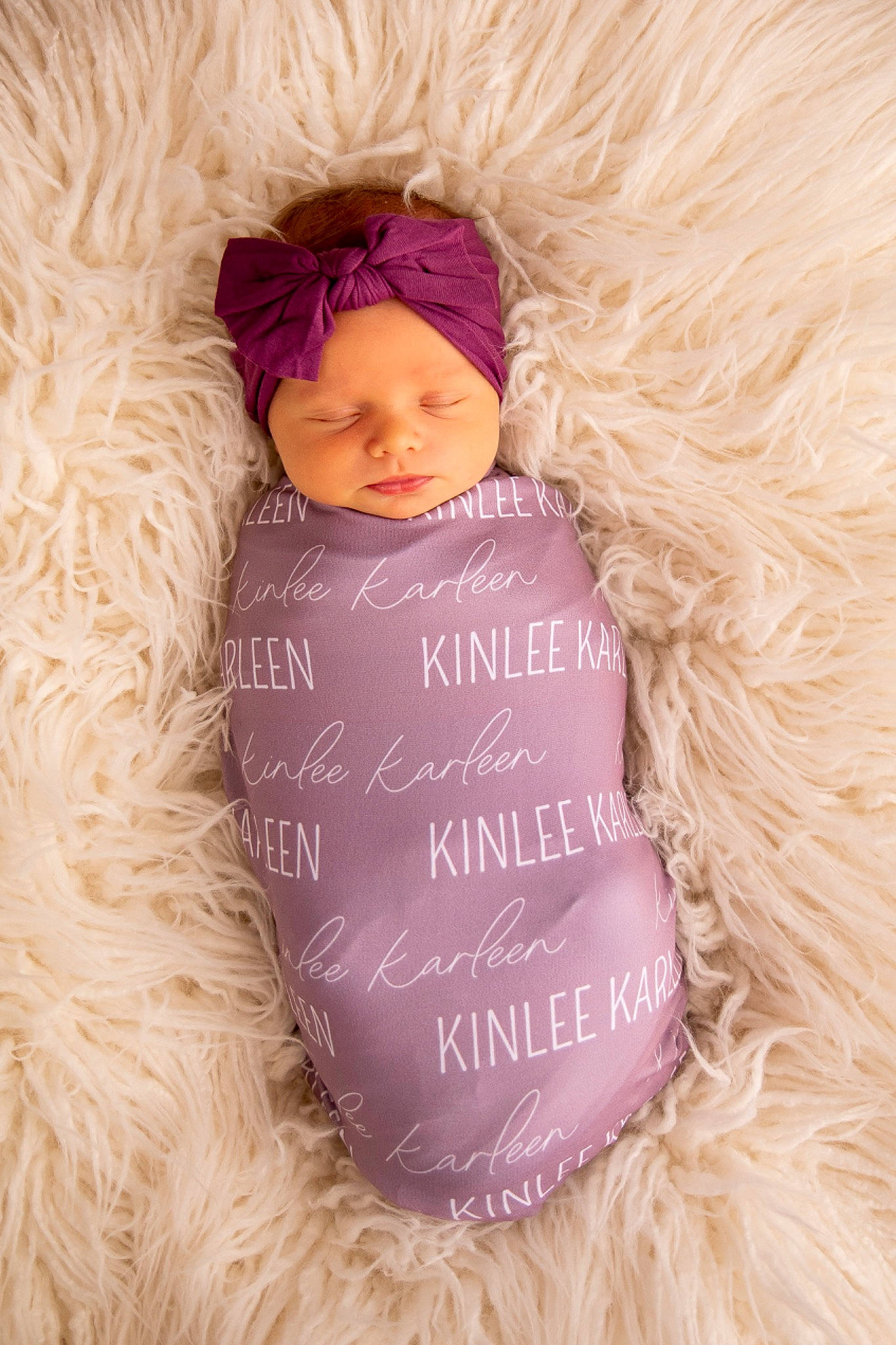 Kinlee is registered to the contest to win money with this photo: baby_toddler_clothing, child, clothing, doll, facial_expression, fawn, happy, headgear, headwear, linens, magenta, outerwear, person, pink, purple, skin, stuffed_toy, teddy_bear, textile, toddler