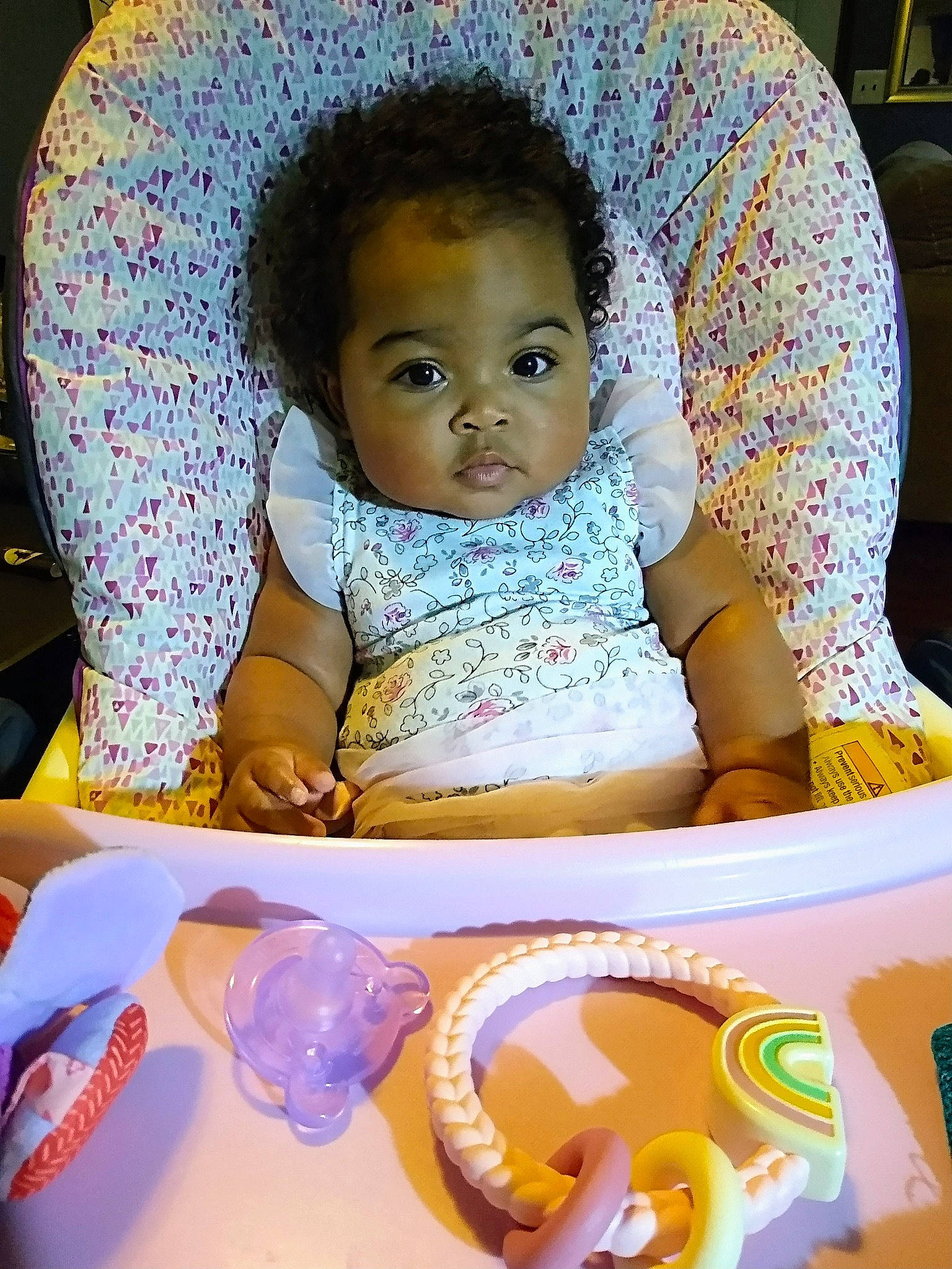 June is registered to the contest to win money with this photo: baby, baby_toddler_clothing, cheek, eyebrow, eyelash, facial_expression, finger, fun, hairstyle, happy, iris, mouth, nose, organ, person, purple, skin, tableware, toddler, white