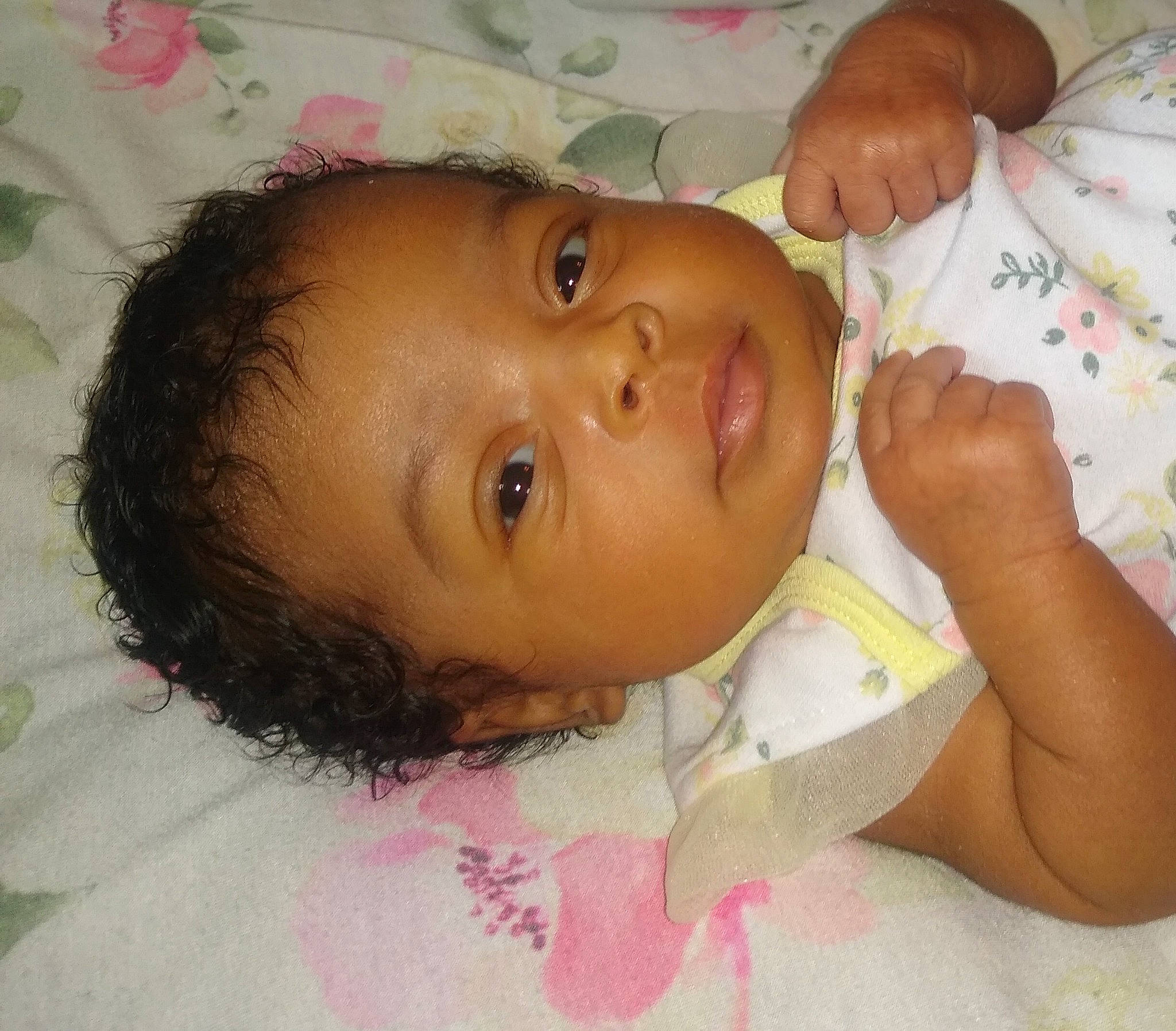 June is registered to the contest to win money with this photo: baby, baby_toddler_clothing, cheek, chest, child, ear, eye, eyebrow, eyelash, happy, human_body, iris, lip, nail, nose, person, pink, skin, smile, thumb