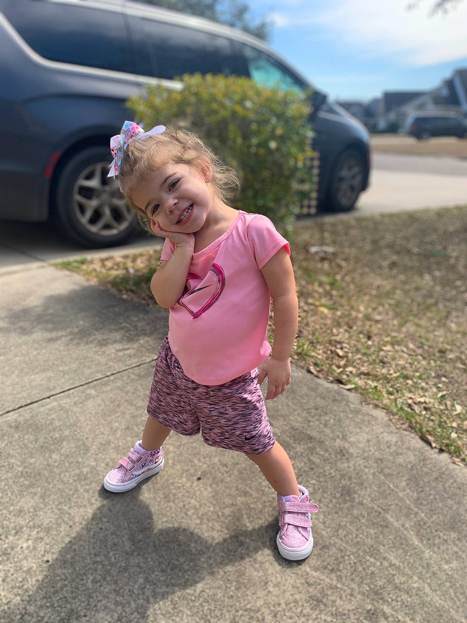 Cameryn joined the competition — help win amazing prizes! asphalt, automotive_design, automotive_lighting, automotive_tire, car, grass, happy, joy, morning, motor_vehicle, person, pink, road, road_surface, shoe, shorts, sneakers, tire, toddler, vehicle