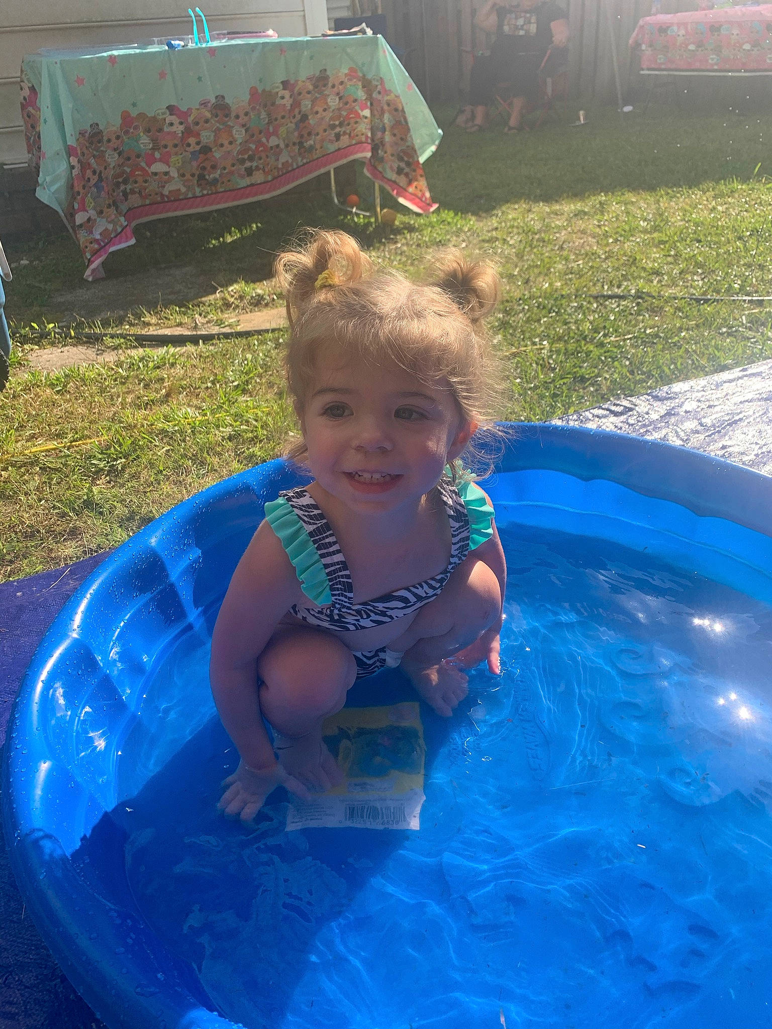 Cameryn is registered to the contest to win money with this photo: aqua, azure, bathing, blue, child, electric_blue, eye, fun, grass, green, happy, joy, leisure, light, person, photograph, product, recreation, smile, summer