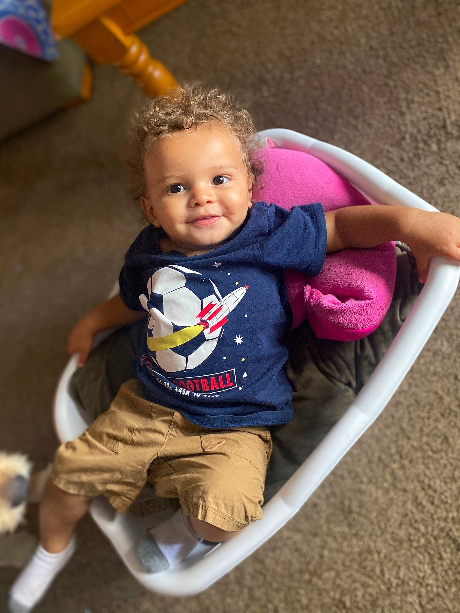 Adrien is registered to the contest to win money with this photo: arm, baby, baby_carriage, baby_toddler_clothing, child, eye, finger, flash_photography, fun, grass, hand, happy, head, human_body, joy, leisure, person, recreation, smile, swing