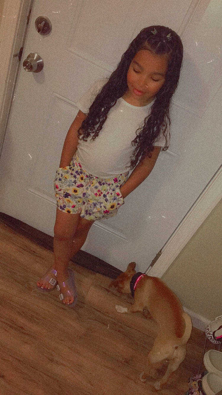 Millani is registered to the contest to win money with this photo: brown_hair, calf, carnivore, companion_dog, dog, dress, eye, fawn, floor, flooring, foot, fun, hardwood, human_leg, knee, layered_hair, long_hair, person, sandal, thigh