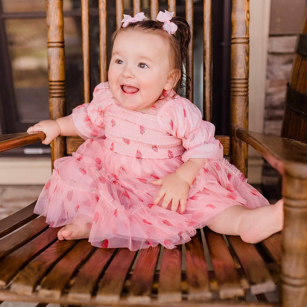 Addison is registered to the contest to win money with this photo: baby, chair, clothing, crib, dress, eveningdress, face, formalwear, furniture, happy, hardwood, head, infantbed, person, photography, portrait, rockingchair, sitting, smile, wood