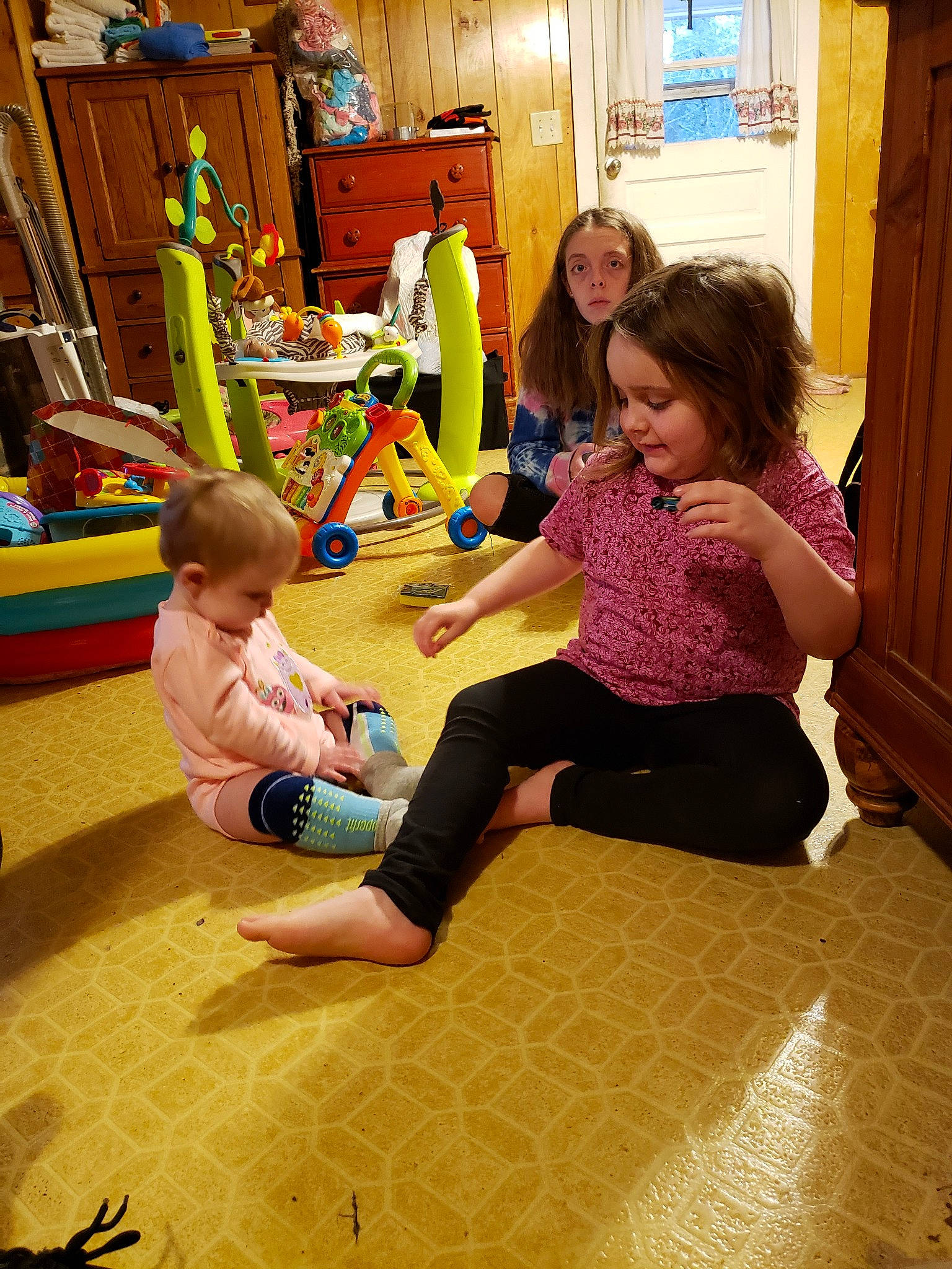 Kenslie is registered to the contest to win money with this photo: child, floor, flooring, fun, kindergarten, leisure, person, play, room, sitting, toddler