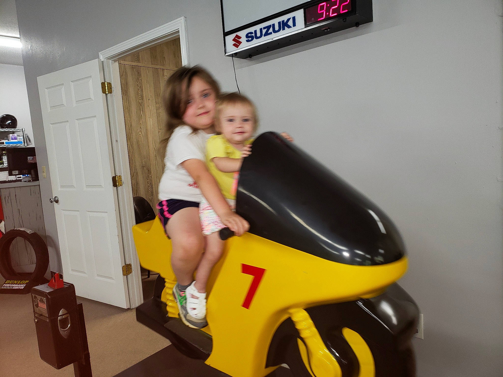 Kenslie joined the competition — help win amazing prizes! automotive_design, automotive_exterior, automotive_wheel_system, car, fender, fun, human_leg, lady, leg, person, scooter, thigh, vehicle, wheel, yellow