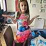 Rosalya participe au concours pour gagner de l'argent avec cette photo : casual, certificate, chair, child, colorful_clothing, curtains, dress, floor_tiles, furniture, girl, home, indoors, person, pink_socks, playful_pose, shelf, standing, table, toys, window