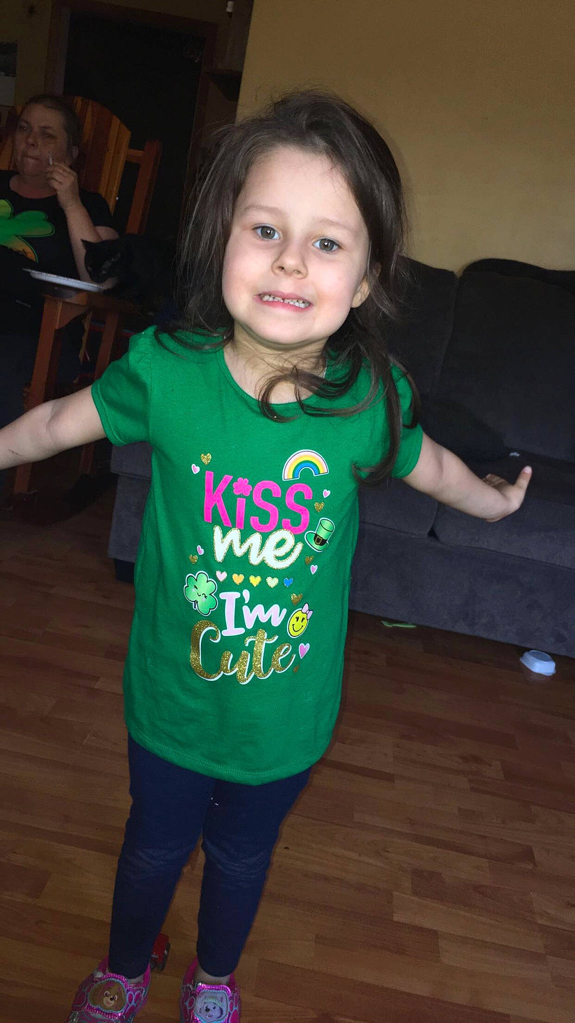 Nakia is registered to the contest to win money with this photo: child, fun, green, head, outerwear, person, sleeve, smile, standing, t_shirt, toddler, top