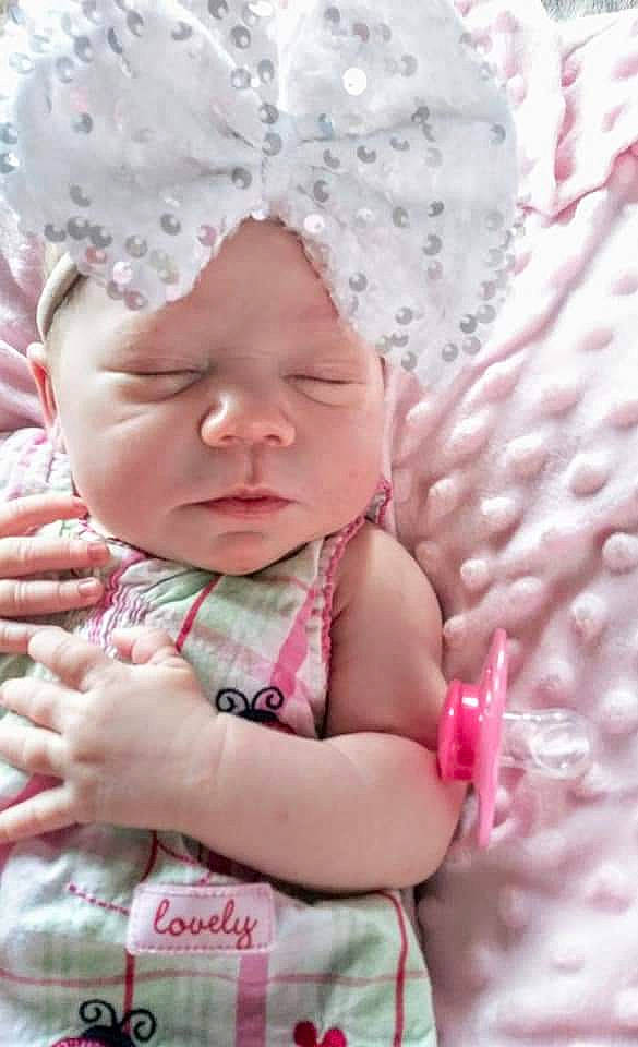 Journee joined the competition — help win amazing prizes! baby, baby_products, baby_toddler_clothing, cap, cheek, child, face, grass, happy, head, headwear, iris, linens, lip, magenta, pattern, person, pink, skin, sleeve