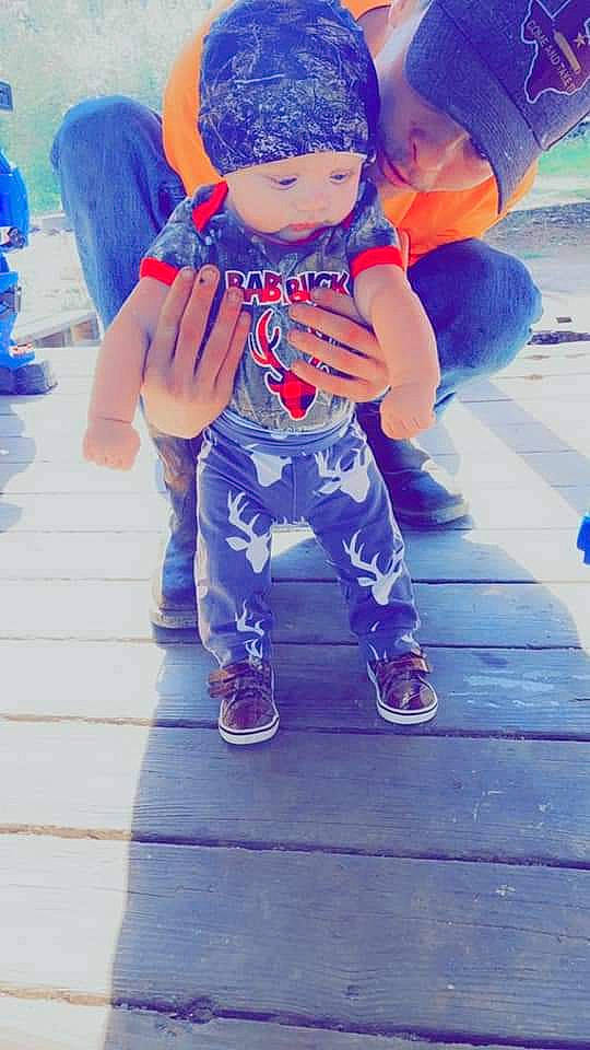 Jaxson joined the competition — help win amazing prizes! baby_toddler_clothing, blue, denim, electric_blue, floor, flooring, fun, happy, hat, headwear, human_leg, leisure, orange, person, personal_protective_equipment, purple, shoe, sneakers, street_fashion, t_shirt