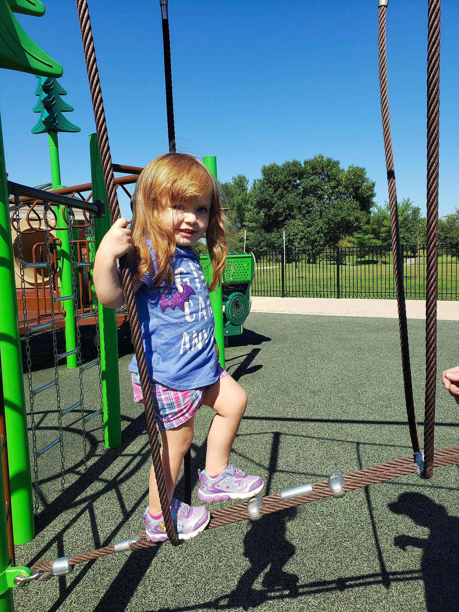 Brett joined the competition — help win amazing prizes! child, city, fun, grass, human_settlement, joy, leisure, net, outdoor_play_equipment, person, play, playground, public_space, recreation, smile, swing, tree