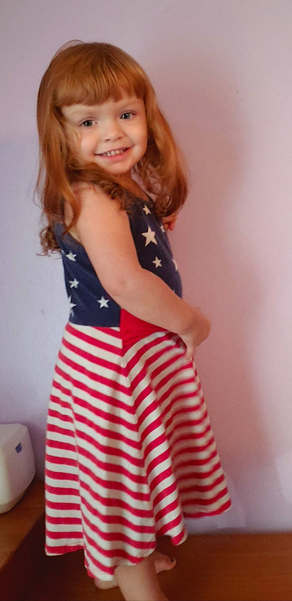 Brett is registered to the contest to win money with this photo: brown_hair, child, child_model, clothing, day_dress, dress, joy, lip, long_hair, neck, pattern, person, shoulder, sleeve, toddler, waist