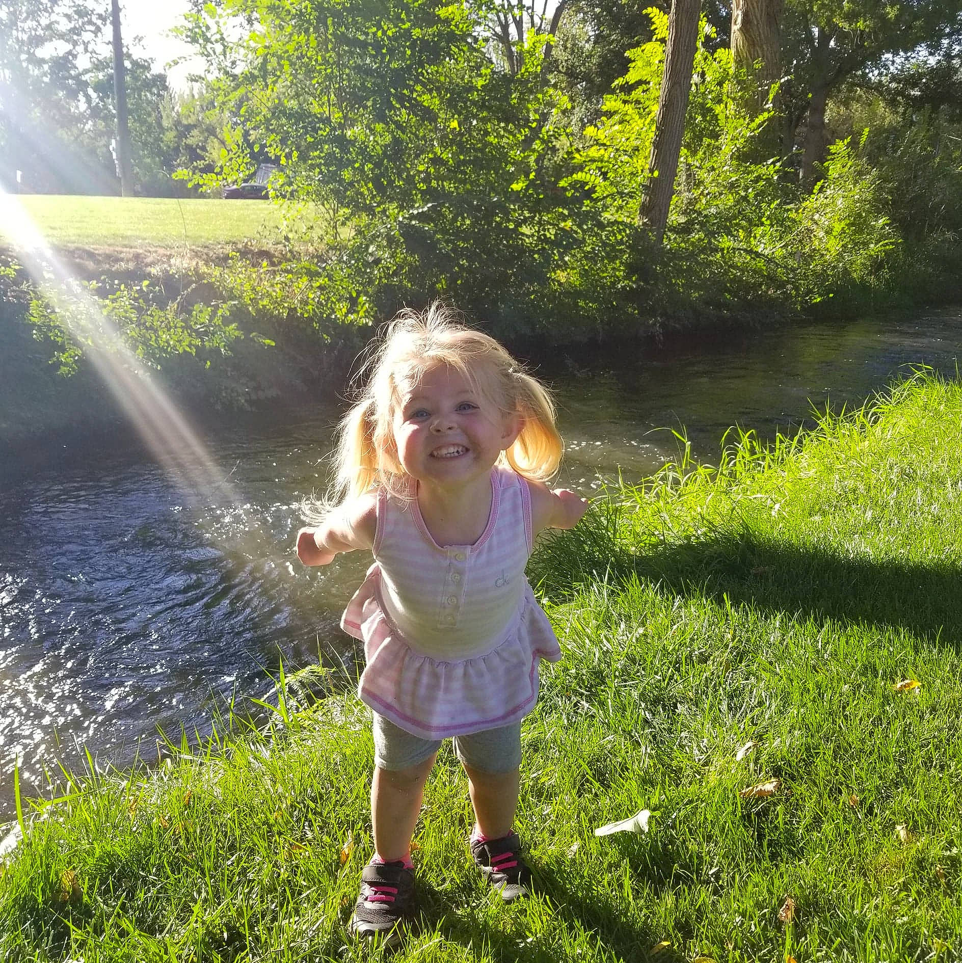 Kiera joined the competition — help win amazing prizes! botany, child, fun, grass, grass_family, green, happy, joy, leaf, light, meadow, morning, nature, people_in_nature, person, smile, spring, summer, sunlight, tree