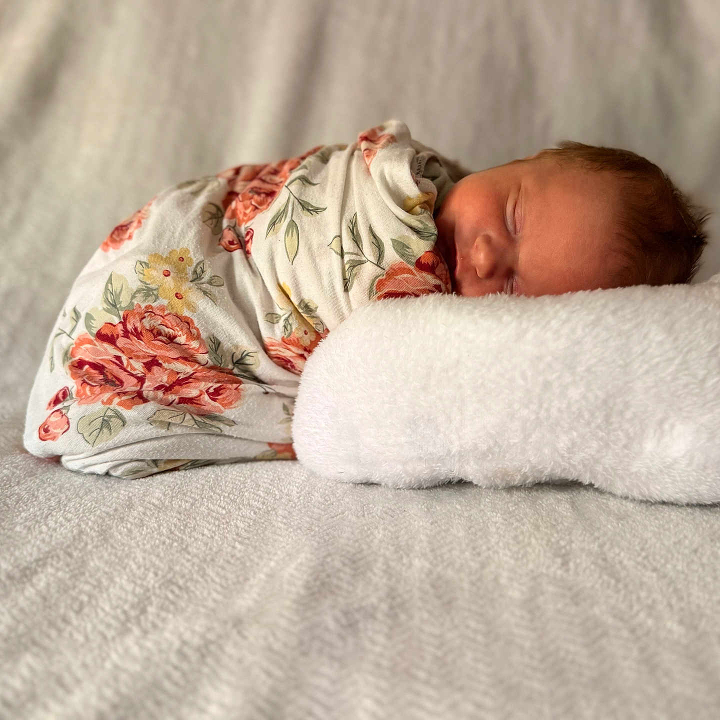 Kinsley joined the competition — help win amazing prizes! newborn, baby, sleeping, blanket, floral, pillow, soft, cozy, resting, infant, wrapped, cute, peaceful, portrait, indoors, child, head, face, warm, comfortable