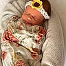Kinsley joined the competition — help win amazing prizes! newborn, baby, sleeping, swaddled, blanket, floral, headband, flower, crocheted, soft, white, texture, infant, cute, peaceful, portrait, closeup, wrapped, resting, indoors