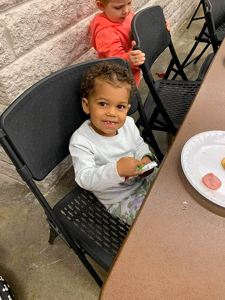 Hazley joined the competition — help win amazing prizes! baby, chair, child, dishware, event, eye, face, fun, furniture, happy, head, headwear, joy, leisure, person, plate, platter, sitting, skin, t_shirt