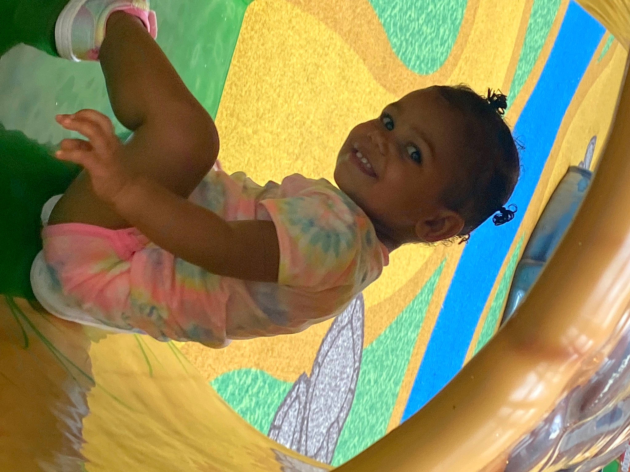 Hazley is registered to the contest to win money with this photo: baby, child, circle, elbow, fun, happy, joy, landscape, leisure, linens, outdoor_play_equipment, pattern, person, play, product, recreation, shade, t_shirt, tints_and_shades, toddler