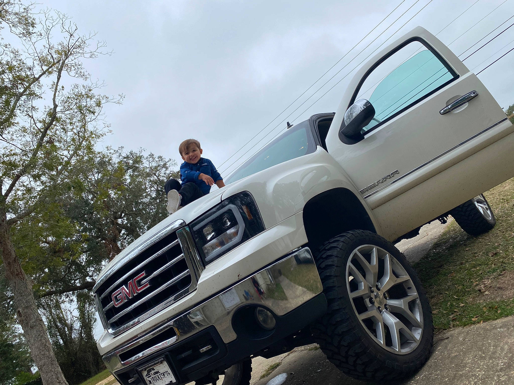 Roy joined the competition — help win amazing prizes! auto_part, automotive_design, automotive_exterior, automotive_tire, automotive_wheel_system, bumper, car, fender, gmc, joy, land_vehicle, off_road_vehicle, off_roading, person, pickup_truck, rim, suspension, tire, tree, truck