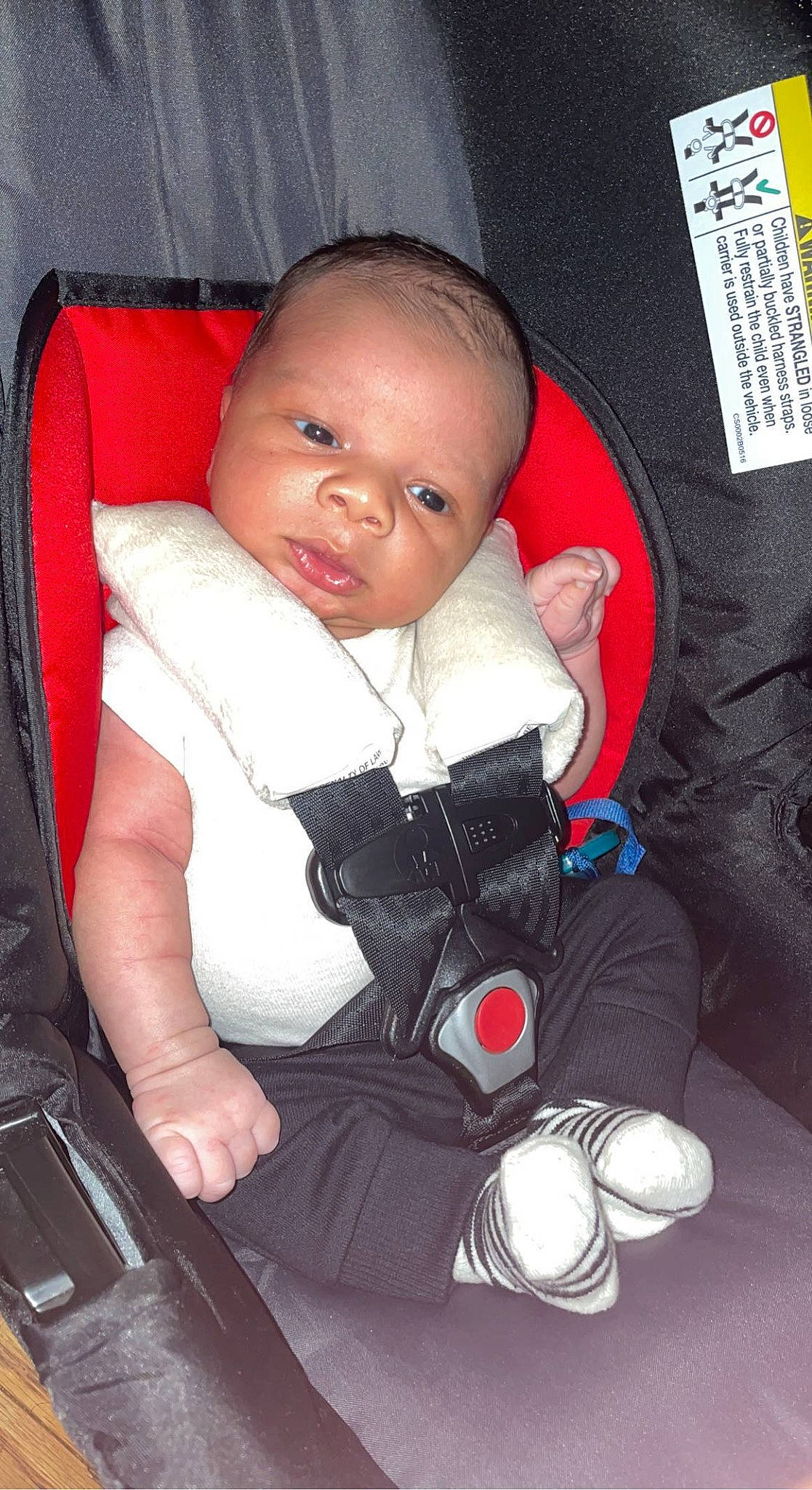Jamarion is registered to the contest to win money with this photo: baby, baby_carriage, baby_products, baby_toddler_clothing, car_seat, chair, cheek, child, comfort, cool, eye, flash_photography, knee, lap, person, seat_belt, sitting, skin, sleeve, thigh