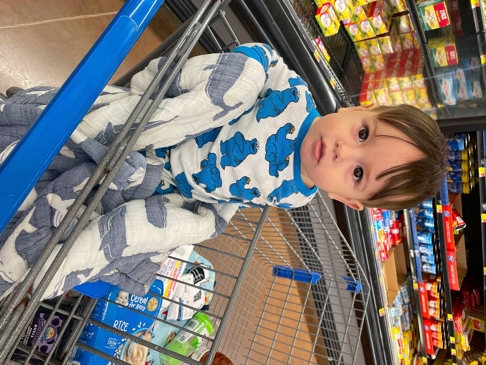 Ezra joined the competition — help win amazing prizes! baby, baby_products, blue, building, child, city, convenience_store, electric_blue, fun, leisure, person, retail, service, shelf, shelving, shopping, street, supermarket, toddler, transport