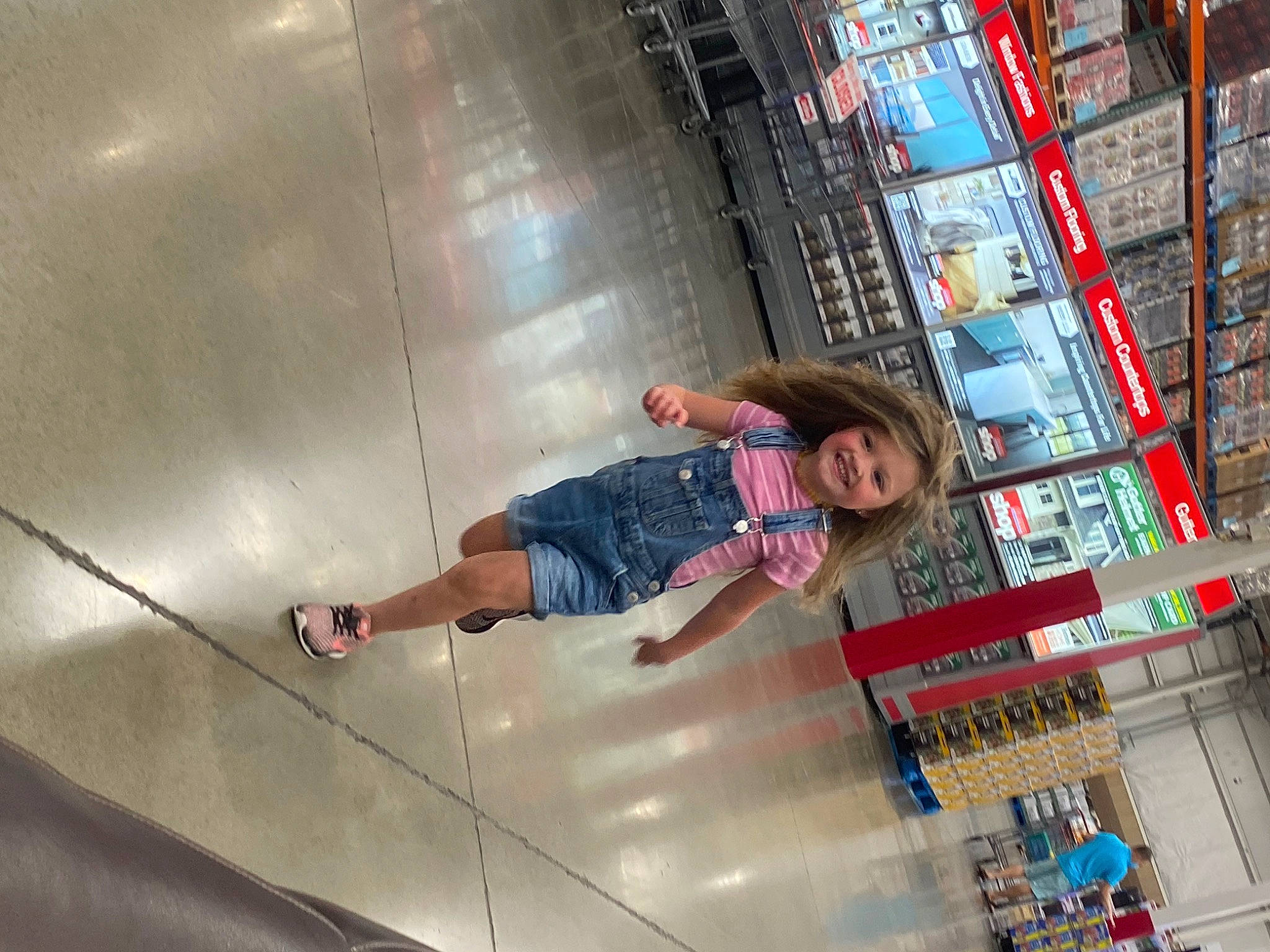 Harper is registered to the contest to win money with this photo: adventure, ceiling, city, denim, flooring, fun, human_leg, joy, knee, leisure, person, recreation, retail, sandal, t_shirt, thigh, waist