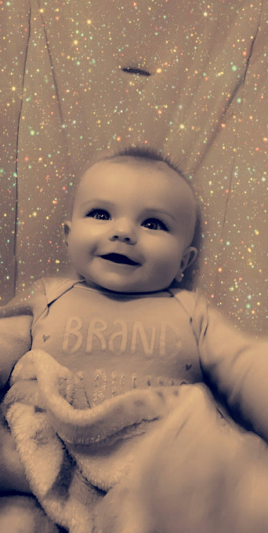 Presleigh is registered to the contest to win money with this photo: baby, cheek, child, face, head, person, skin, smile, snow, toddler