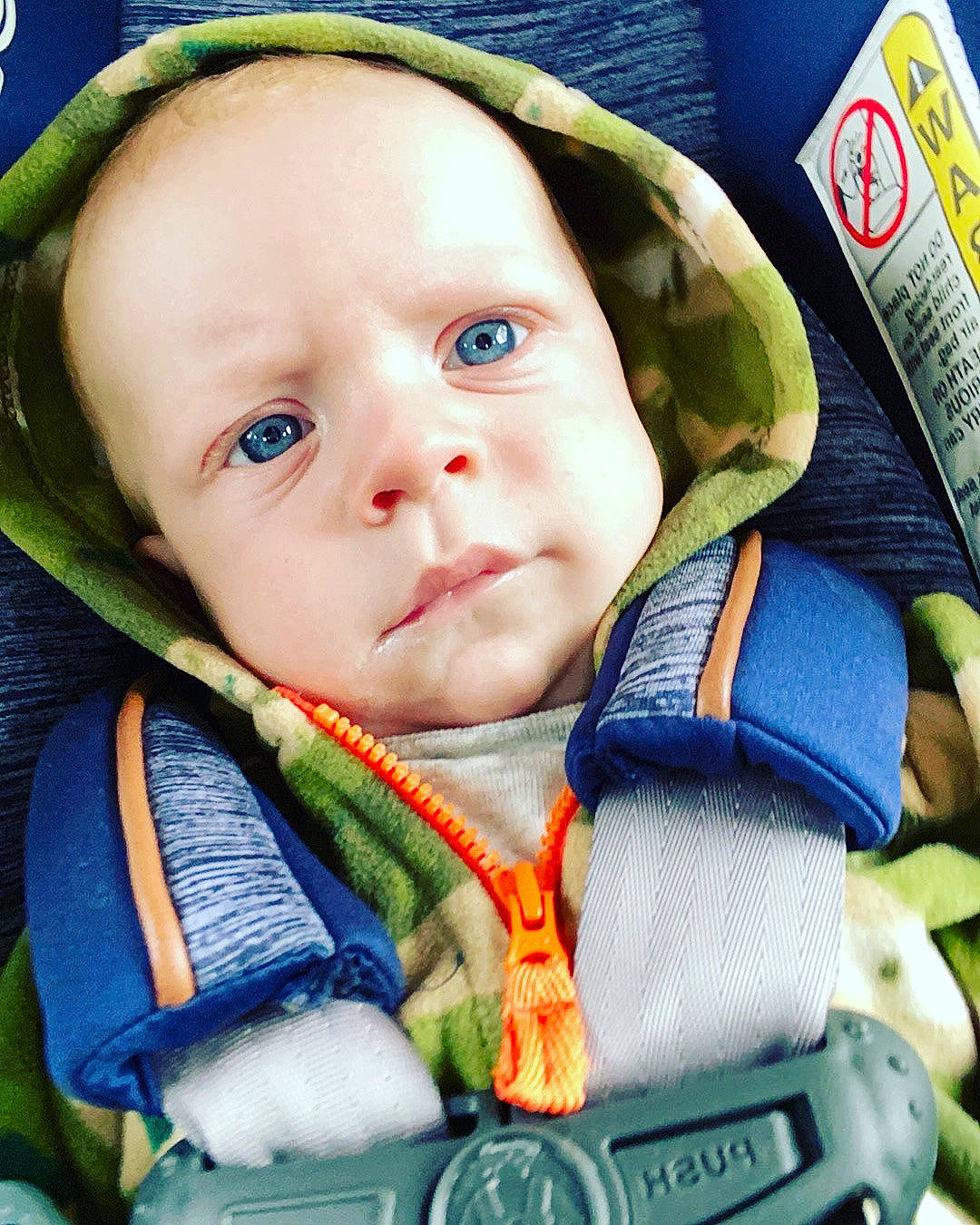 Gatlin is registered to the contest to win money with this photo: baby, baby_carriage, baby_in_car_seat, baby_products, car_seat, cheek, child, eye, fictional_character, forehead, head, nose, person, toddler