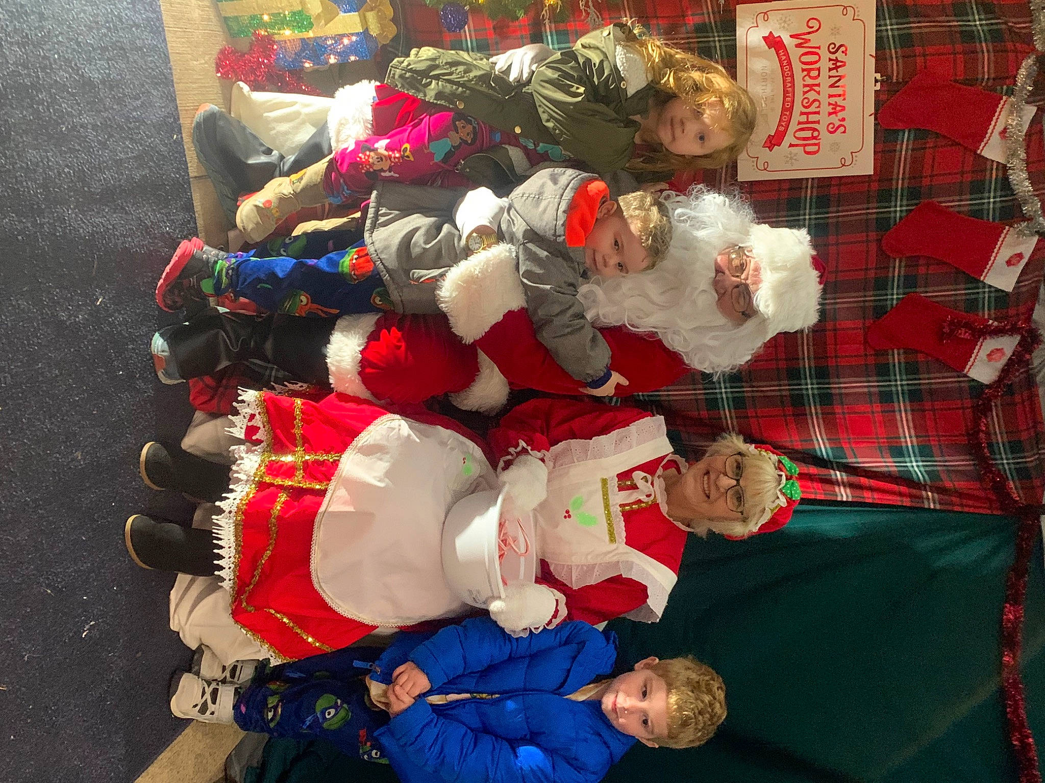 Cole joined the competition — help win amazing prizes! carmine, child, christmas, christmas_eve, costume, event, fictional_character, fun, holiday, joy, lap, pattern, person, plaid, sleeve, smile, sock, tartan, team, thigh