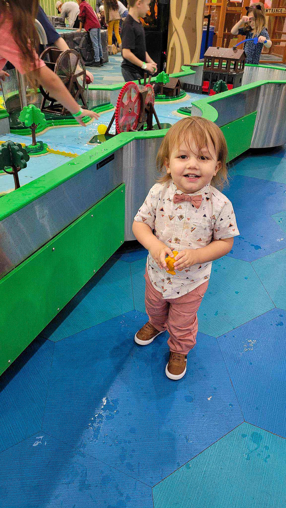 Carter joined the competition — help win amazing prizes! bag, child, city, event, flooring, fun, grass, green, happy, joy, leg, leisure, motor_vehicle, pattern, person, recreation, sandal, shoe, smile, sneakers