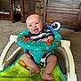 Archer is registered to the contest to win money with this photo: baby, ball, cabinet, chair, face, football, furniture, happy, head, homedecor, indoors, person, photography, plant, portrait, pottedplant, sitting, soccer, soccerball, sport