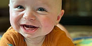 Archer is registered to the contest to win money with this photo: baby, babylaughing, bodypart, clothing, crawling, face, finger, hand, happy, head, indoors, laughing, mouth, newborn, person, photography, portrait, sitting, smile, teeth