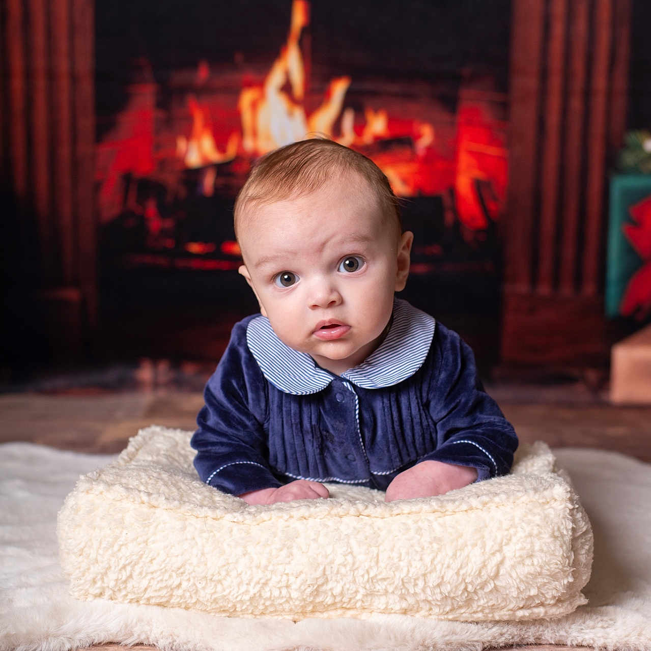 Rome Alessio Difuria is registered to the contest to win money with this photo: baby, bodypart, couch, cushion, face, finger, fireplace, furniture, hand, hardwood, head, hearth, homedecor, indoors, interiordesign, person, photography, portrait, sitting, wood
