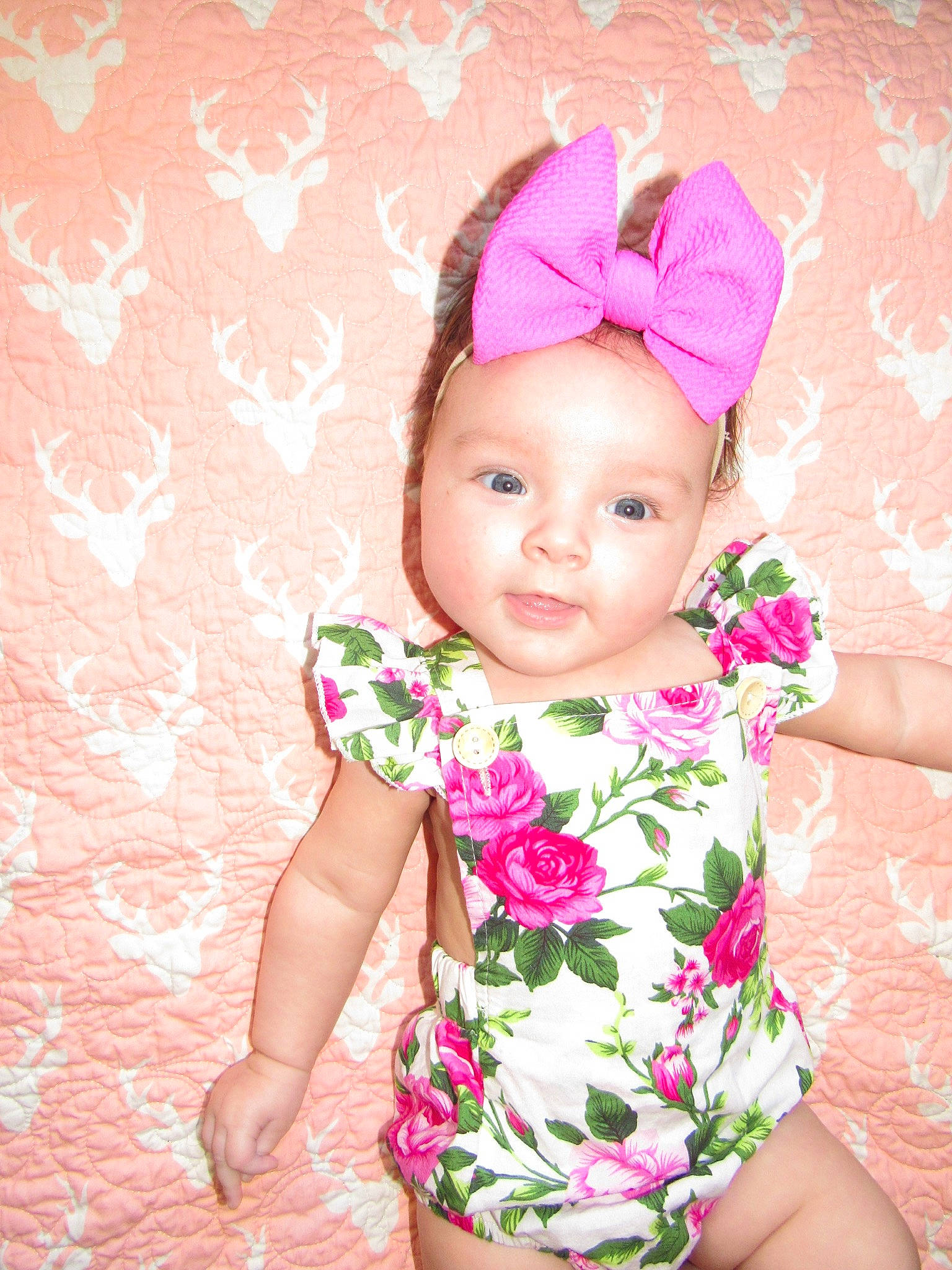 Maisyn is registered to the contest to win money with this photo: baby, baby_products, baby_toddler_clothing, child, child_model, clothing, design, dress, fashion_accessory, flower, hair_accessory, headband, headgear, pattern, person, petal, pink, plant, product, toddler