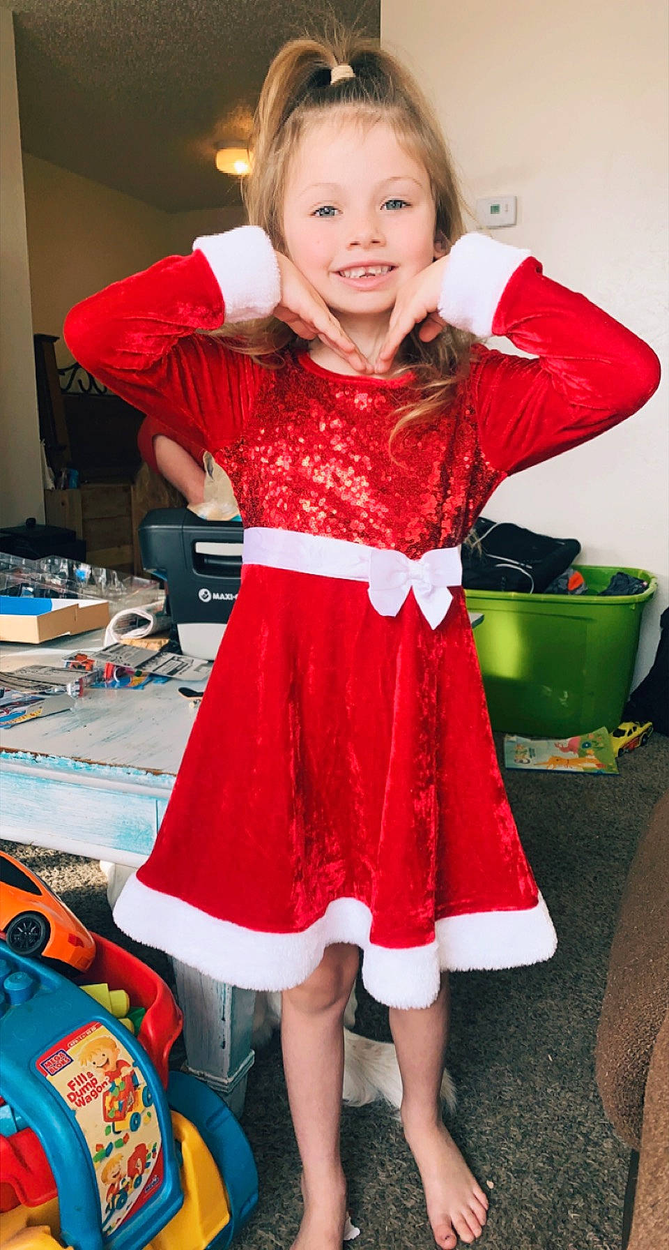 Sophia joined the competition — help win amazing prizes! bag, chair, child, cooking, costume, dress, event, fashion_design, fun, happy, holiday, homemaker, joy, luggage_and_bags, pattern, person, red, room, sleeve, smile