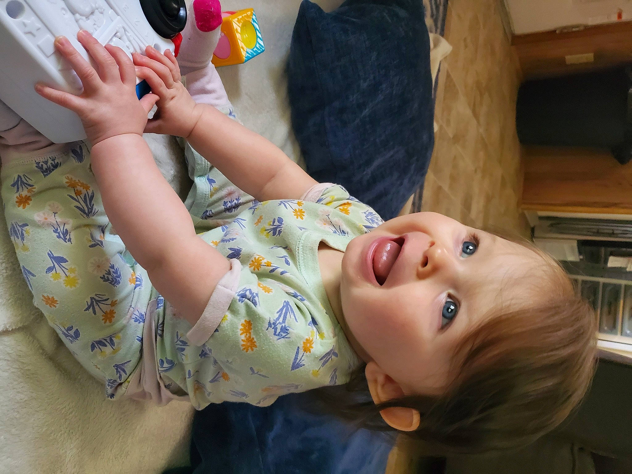 Adeline is registered to the contest to win money with this photo: arm, child, ear, finger, fun, hand, leg, nail, neck, person, toddler