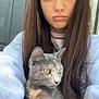 woman, cat, outdoor, selfie, long_hair, gray_cat, yellow_eyes, sweatshirt, serious_expression, door, window, reflection, sitting, pet, animal, casual, portrait, young_adult, nature, sunlight