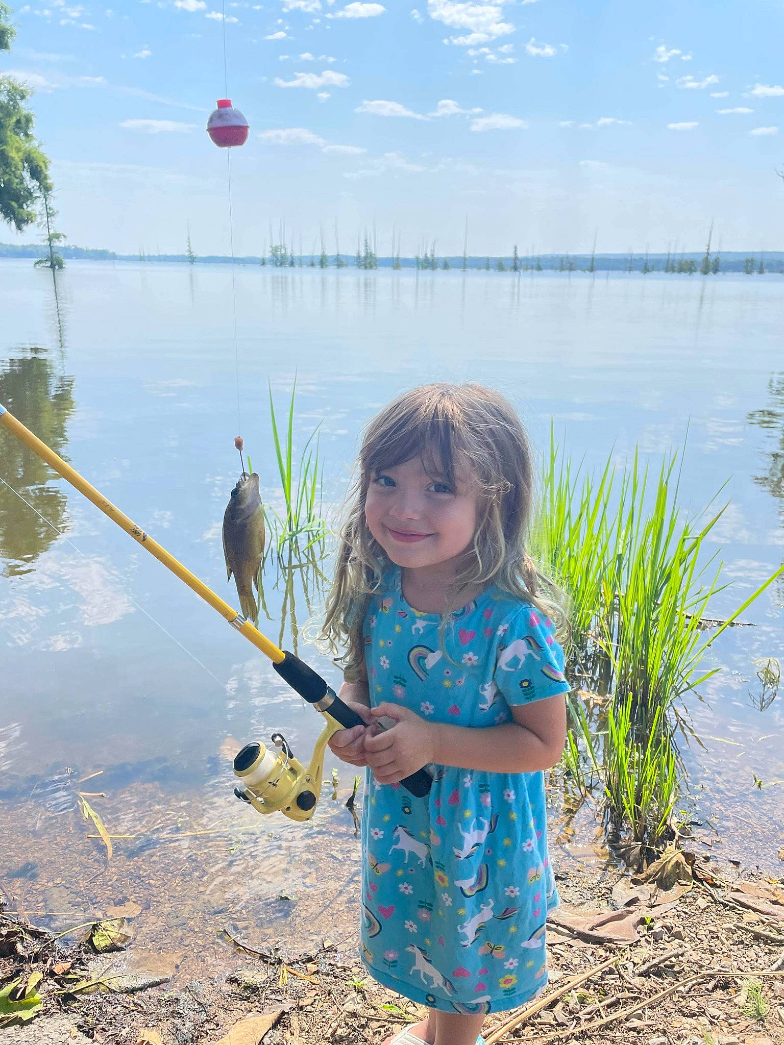 Izabella joined the competition — help win amazing prizes! botany, cloud, fisherman, fun, grass, grass_family, joy, lake, leisure, morning, natural_environment, nature, people_in_nature, person, plant, shore, sky, summer, toddler, tree