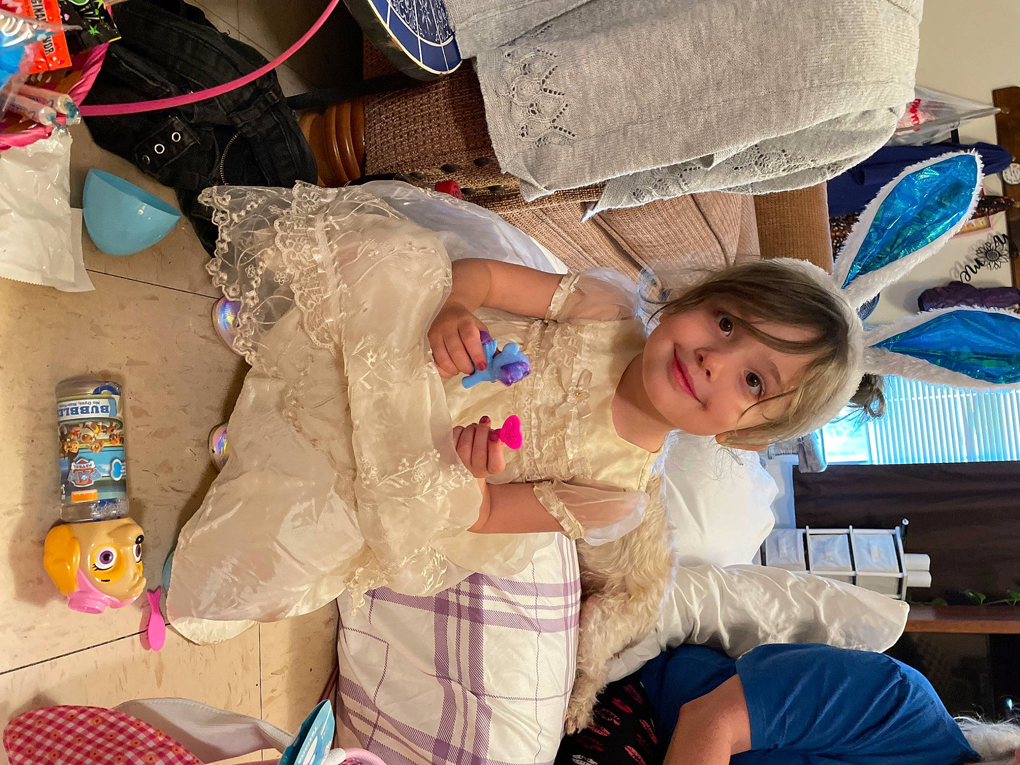 Izabella joined the competition — help win amazing prizes! blue, child, comfort, fashion_accessory, fun, happy, hat, human_leg, joy, lap, mechanical_fan, pattern, person, plastic, room, shorts, sitting, smile, thigh, toddler