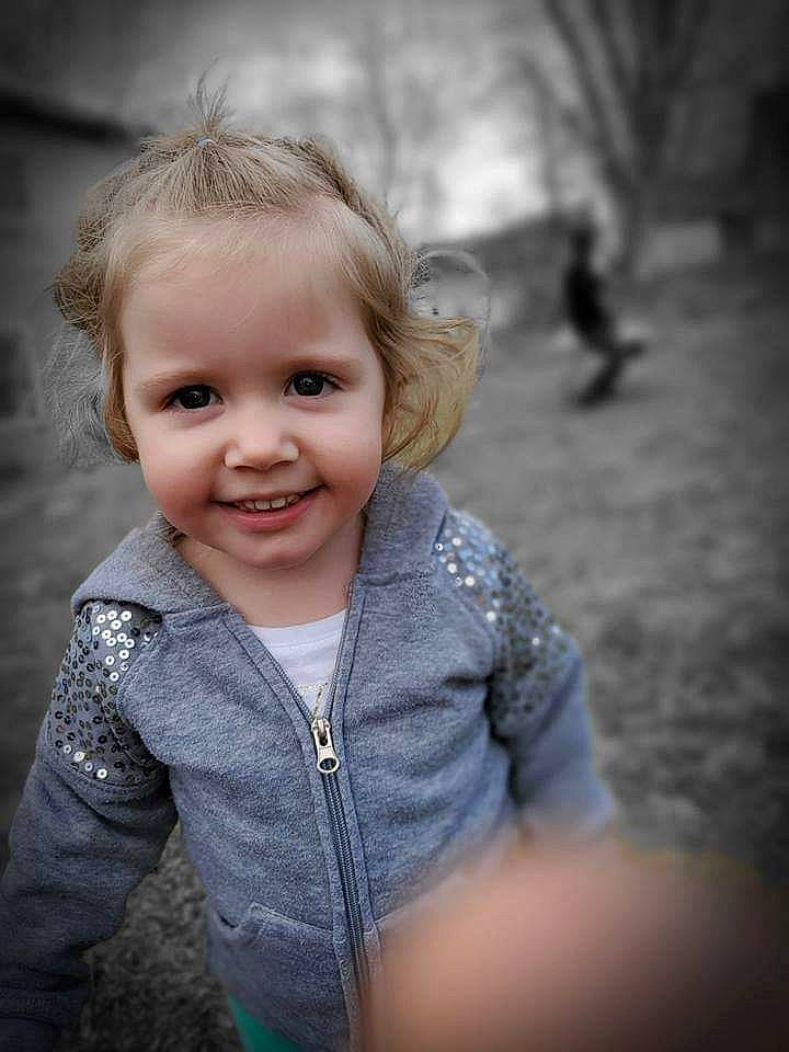 Blakelynn is registered to the contest to win money with this photo: blond, cheek, child, eye, face, facial_expression, grass, head, human, joy, lip, nose, people, person, photograph, photography, portrait, skin, smile, standing