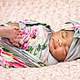 baby, bed, blanket, bodypart, bonnet, clothing, face, finger, furniture, hand, happy, hat, head, newborn, person, photography, portrait, quilt, sleeping, smile