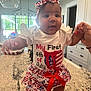 Maylee joined the competition — help win amazing prizes! baby, child, infant, kitchen, countertop, clothing, headband, red_bow, american_flag_pattern, celebration, holiday, 4th_of_july, holding_hands, person, indoor, happy, smiling, cute, festive, family