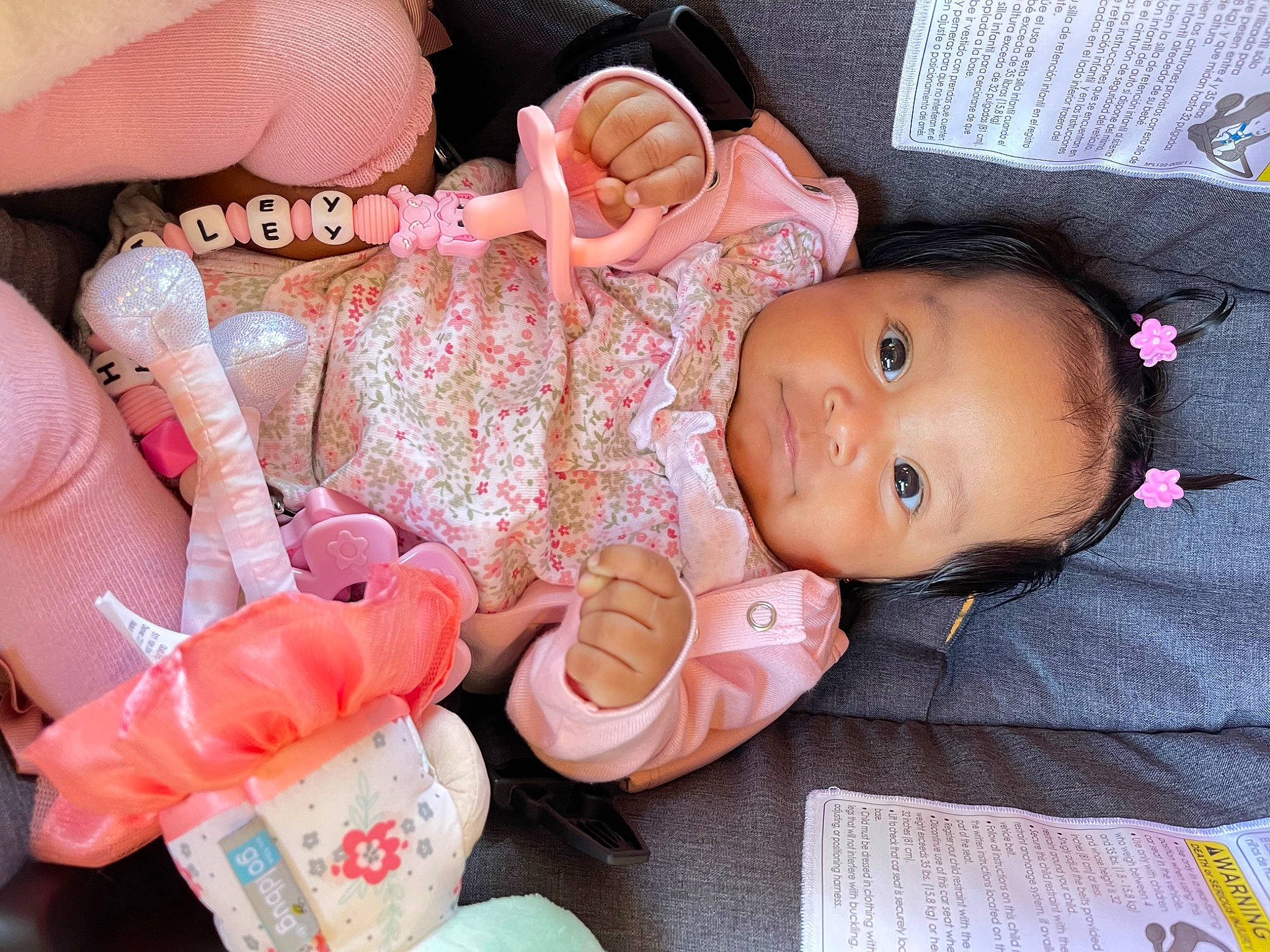 Hailey joined the competition — help win amazing prizes! baby, baby_products, baby_toddler_clothing, cheek, child, drinkware, eyelash, fashion_accessory, finger, lip, nail, pattern, peach, person, pink, skin, thumb, toddler, wrist