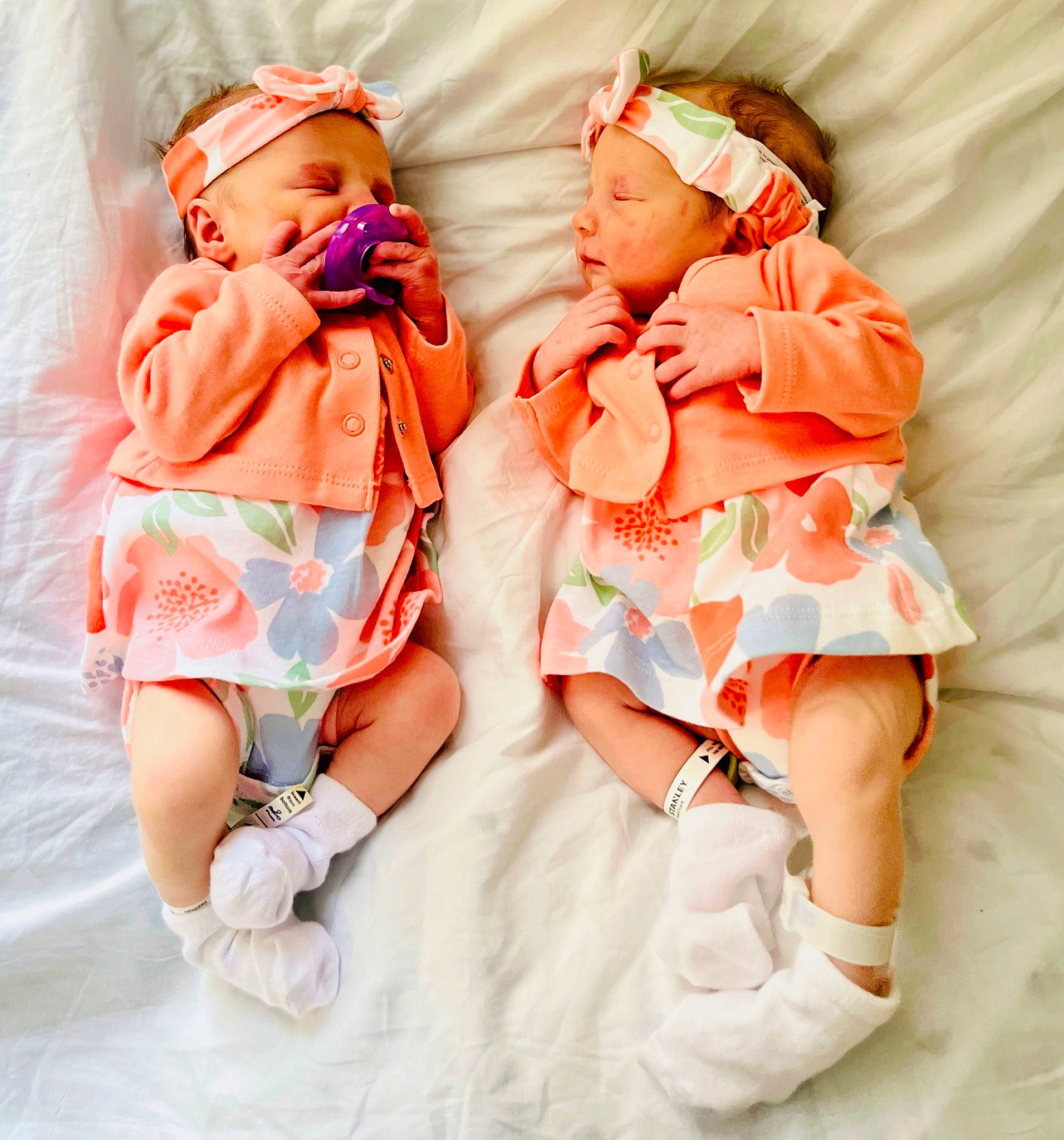 Nova And Everleigh joined the competition — help win amazing prizes! abdomen, baby, baby_sleeping, baby_toddler_clothing, comfort, dress, event, gesture, happy, headwear, human_body, human_leg, nail, pattern, peach, person, pink, shoe, sleeve, thigh