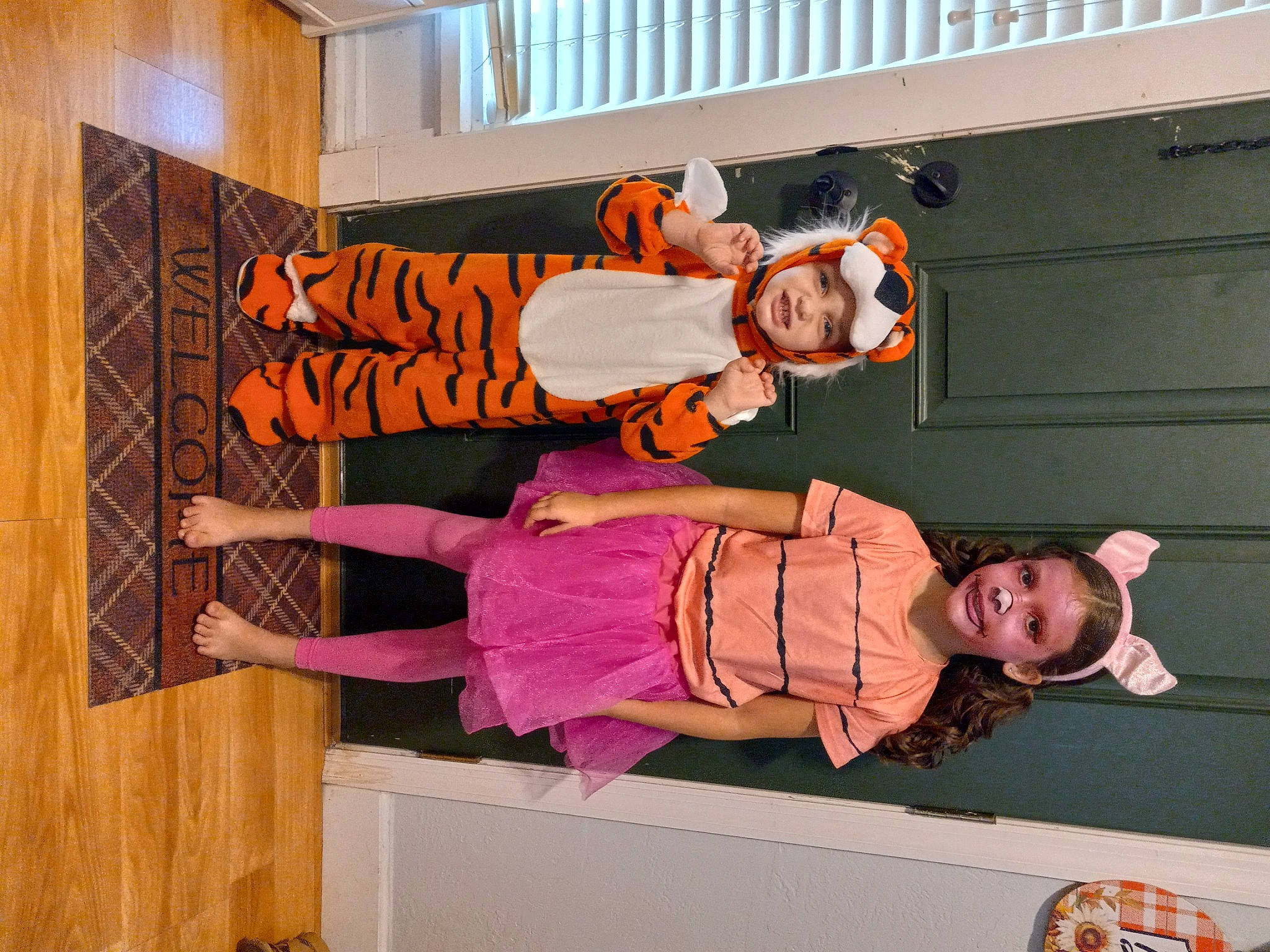 Harvey is registered to the contest to win money with this photo: child, fun, happy, hat, headwear, joy, magenta, orange, pattern, peach, person, plant, room, sandal, smile, thigh, toddler, wood, wrist