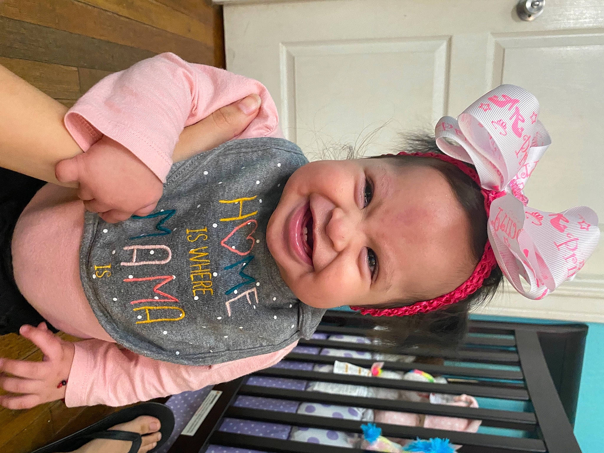 Angelique is registered to the contest to win money with this photo: baby_toddler_clothing, child, eye, eyelash, facial_expression, fashion_accessory, finger, fun, gesture, happy, hat, headgear, mammal, mouth, pattern, person, sleeve, smile, textile, toddler