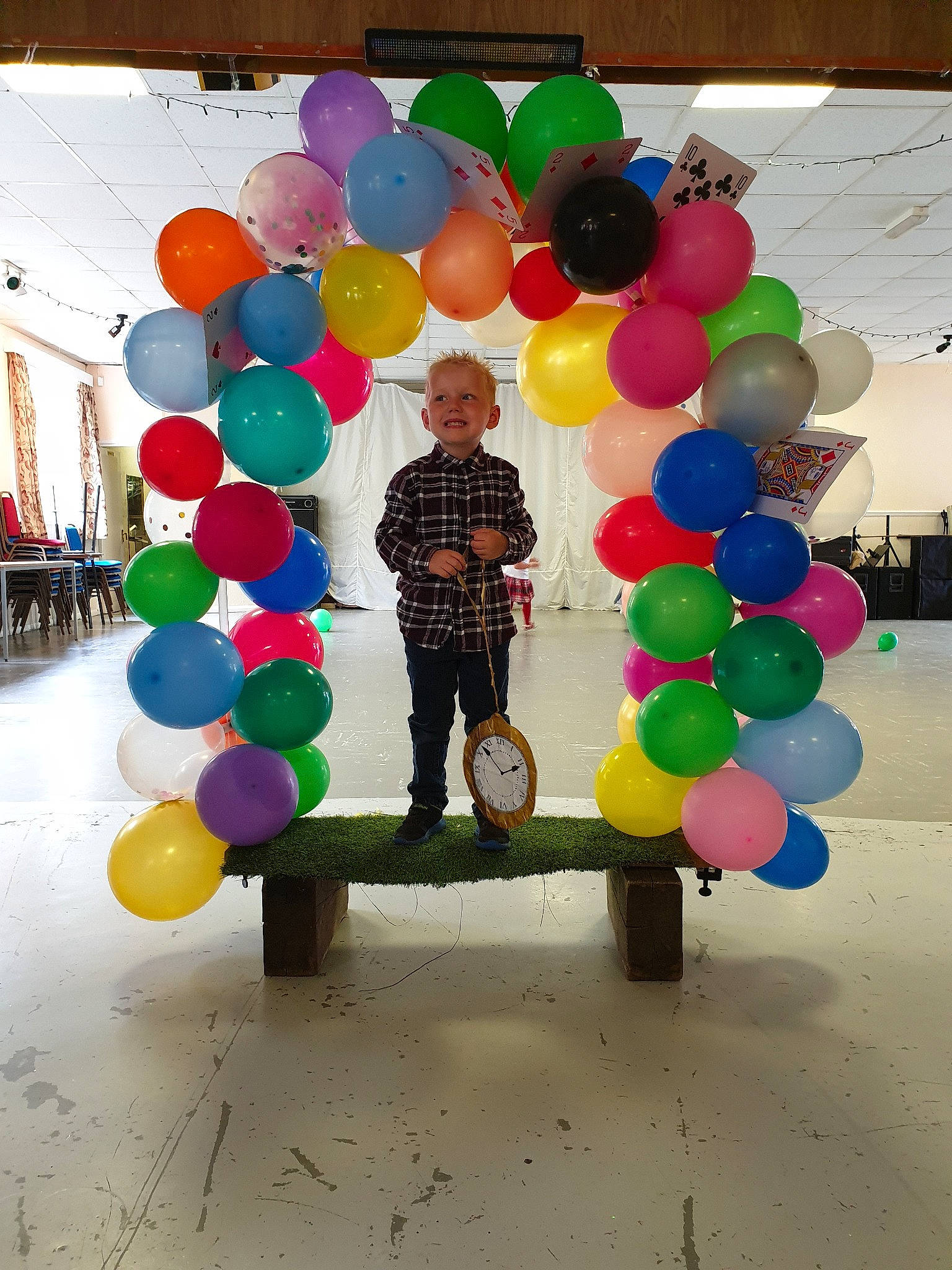 James is registered to the contest to win money with this photo: arch, architecture, balloon, fun, joy, leisure, party, party_supply, person, recreation, toy