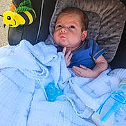 Wyatt joined the competition — help win amazing prizes! baby, newborn, infant, blanket, blue_clothing, car_seat, pacifier, baby_bottle, toy, bee_toy, face, head, person, cute, child, indoors, soft_texture, comfort, wrapped, resting
