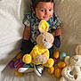 Kyrie joined the competition — help win amazing prizes! baby, bed, blanket, clothing, couch, cushion, face, furniture, glove, head, homedecor, medication, person, photography, pill, plush, portrait, quilt, teddybear, toy