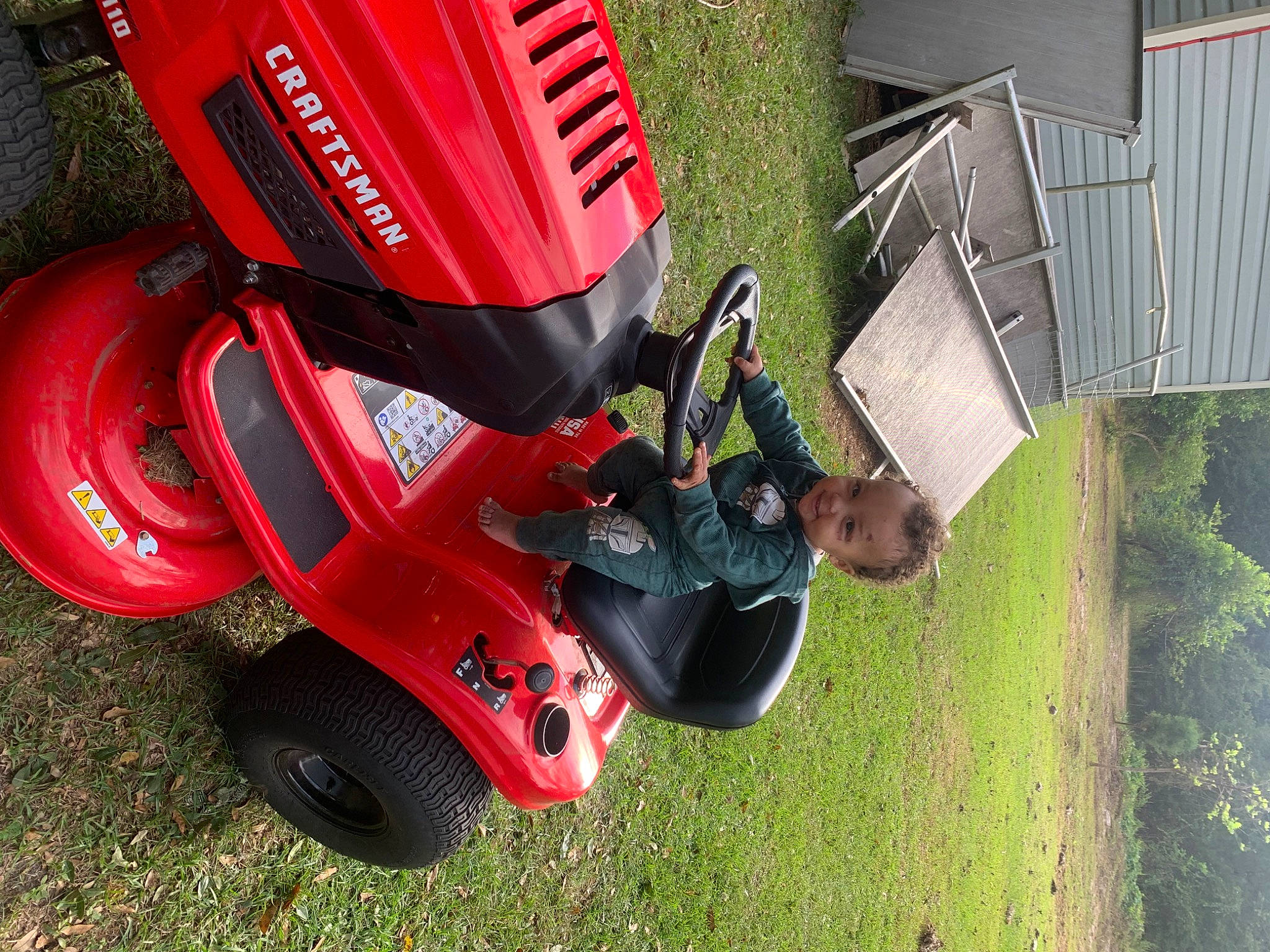 Caiden is registered to the contest to win money with this photo: auto_part, automotive_design, automotive_exterior, automotive_lighting, automotive_tire, automotive_wheel_system, bicycle_helmet, fender, grass, helmet, motor_vehicle, person, personal_protective_equipment, plant, recreation, rim, sports_equipment, sports_gear, tire, vehicle