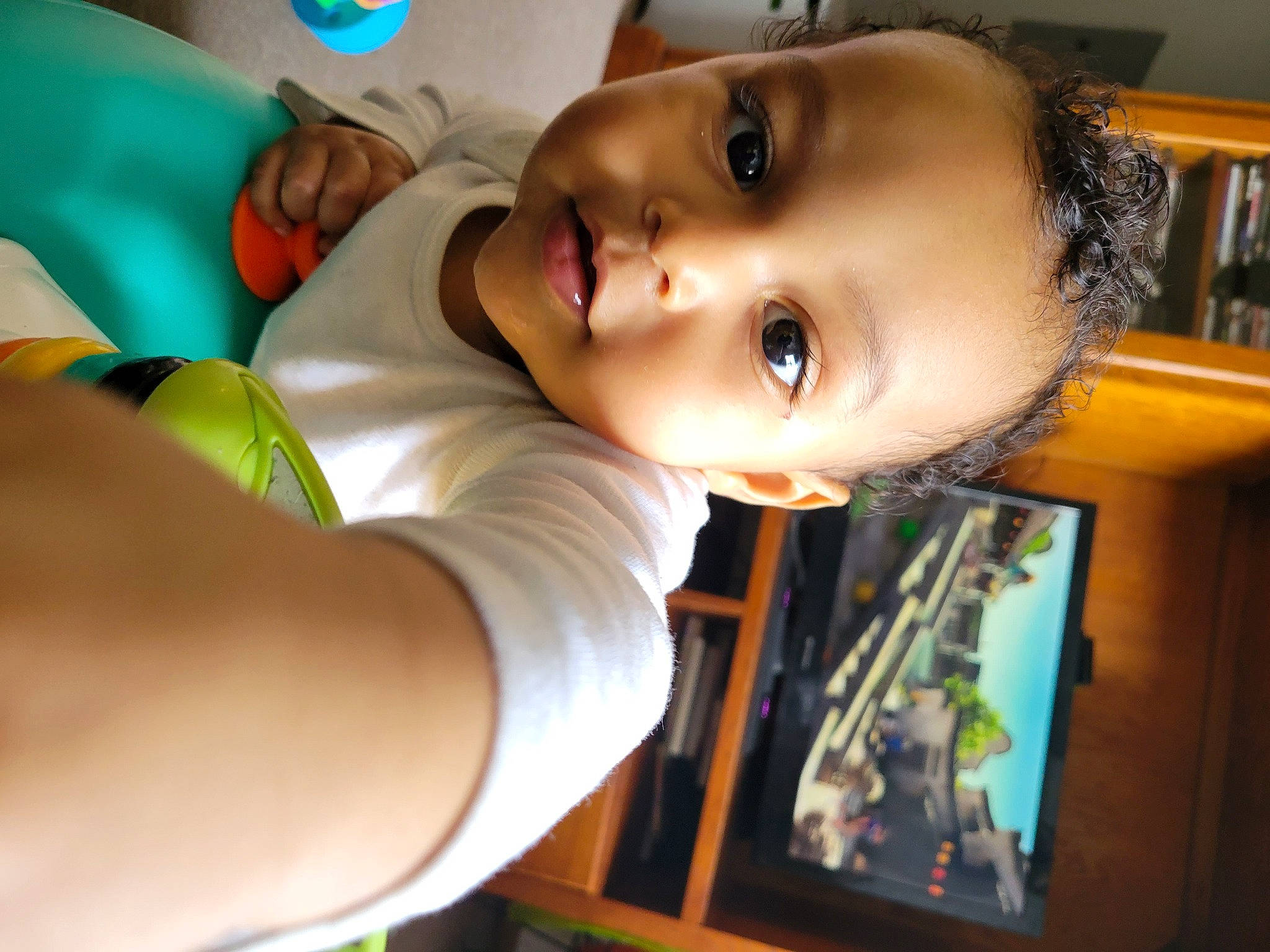 Jalen is registered to the contest to win money with this photo: black_hair, bookcase, cheek, chin, eye, eyebrow, eyelash, flash_photography, forehead, fun, happy, iris, lip, mouth, neck, nose, person, shelf, skin, smile